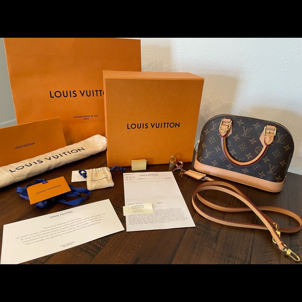 Louis Vuitton Alma BB M53152 lightly used, authentic with proof of purchase